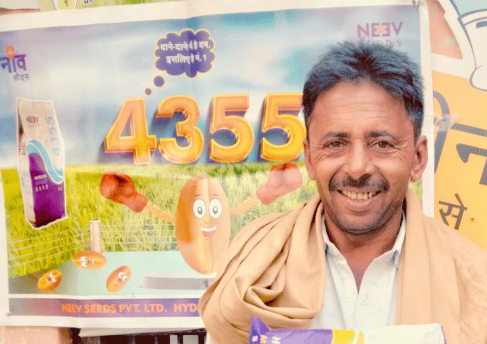 Neev Seeds ad creative with a smiling farmer, from before the brand reached the shops