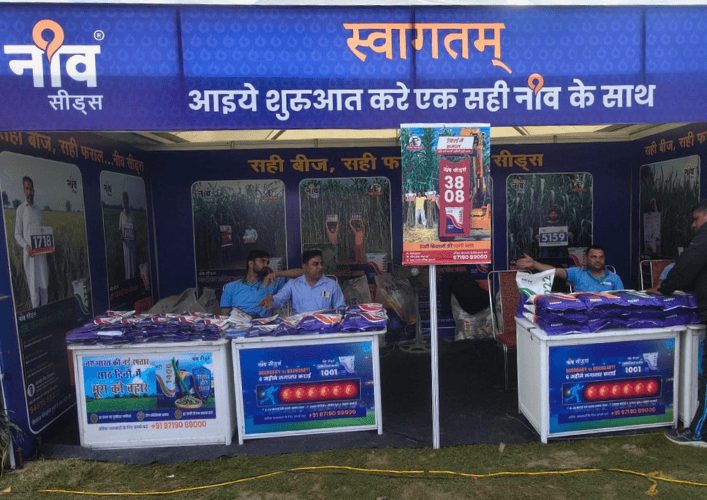Redesigned Neev Seeds trade-show stand with branded counters and product displays